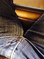 Seated Jeans Bulge